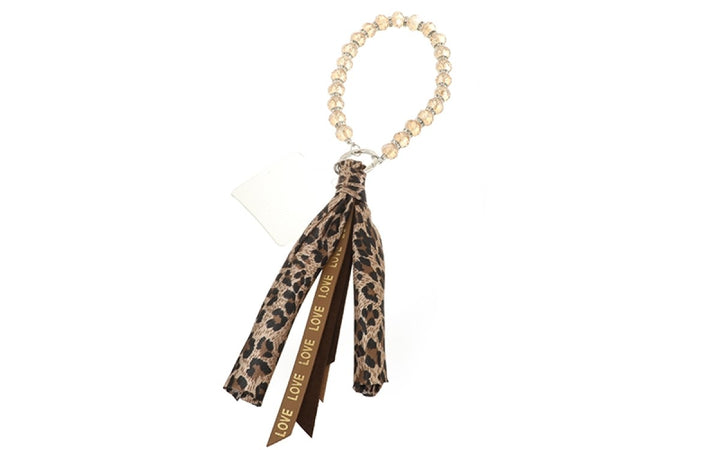 Sleutelhanger Bag Charm Telefoonkoord Amber Champagne