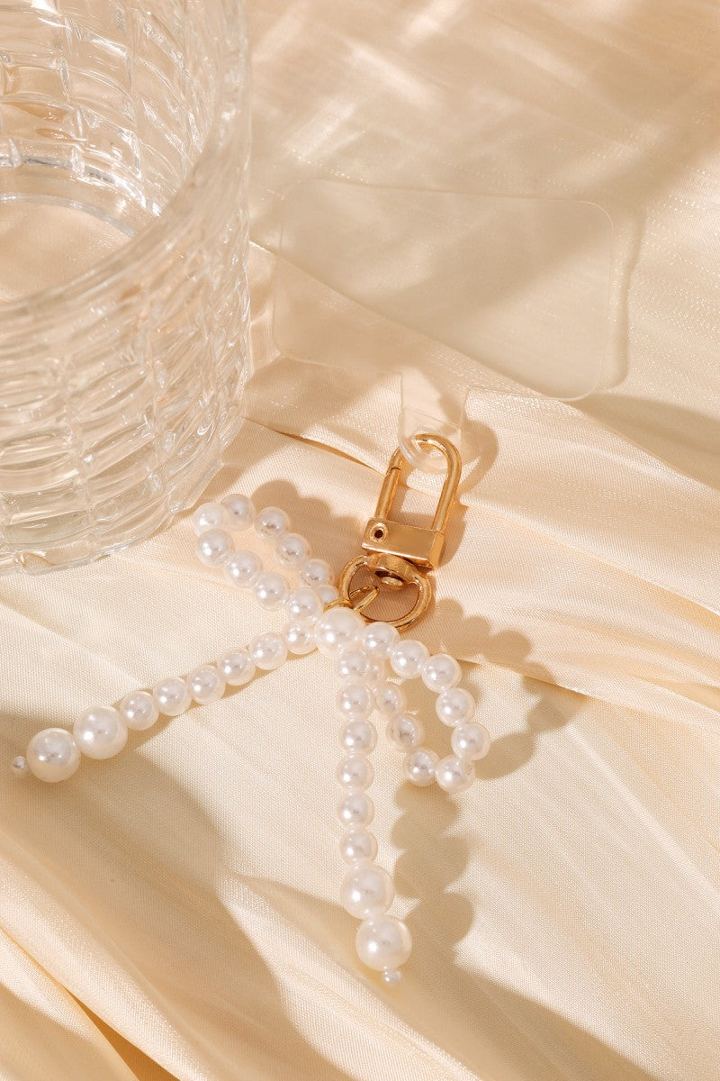 Telefoonhanger Pearl Bow Goud